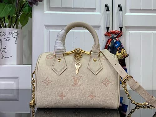 Louis Vuitton (modelo Speedy Bandoulière 20 ou 25 em pele com monograma gravado/bordado)